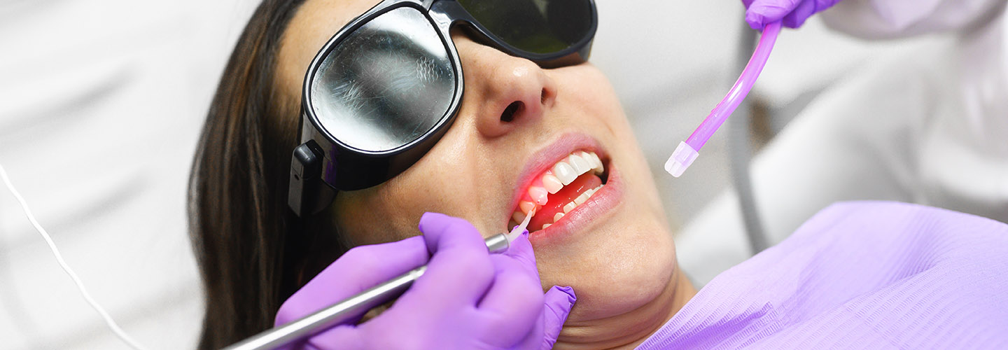 Dentist Using A Modern Diode Dental Laser